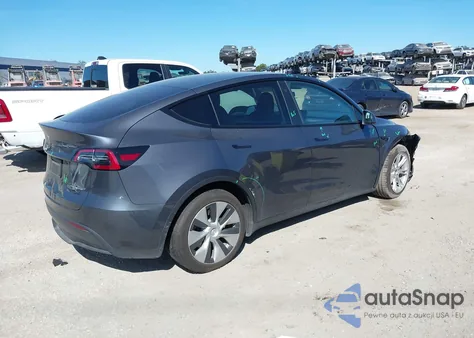 2023 Tesla Model Y Awd/Long Range Dual Motor All-Wheel Drive z USA, uszkodzony, nr VIN 7SAYGAEE1PF769999